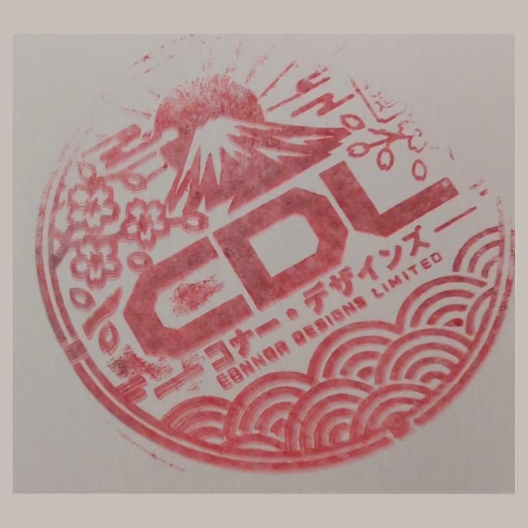 Ink impression of the CDL Connor Design Limited stamp with Mount Fuji and waves
